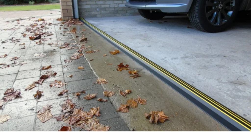 Garage door seal blocks leaves and rain.
