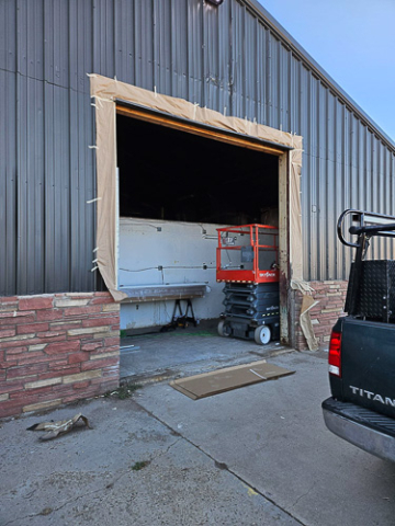 opening for a new commercial garage door